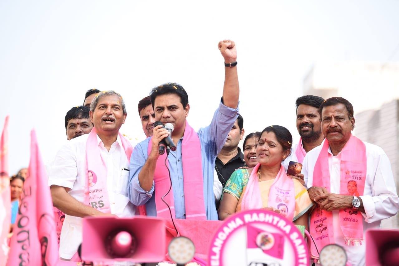 TRS working president KTR addressing the massive gathering during his  roadshow in Vemulawada. | K. T. Rama Rao